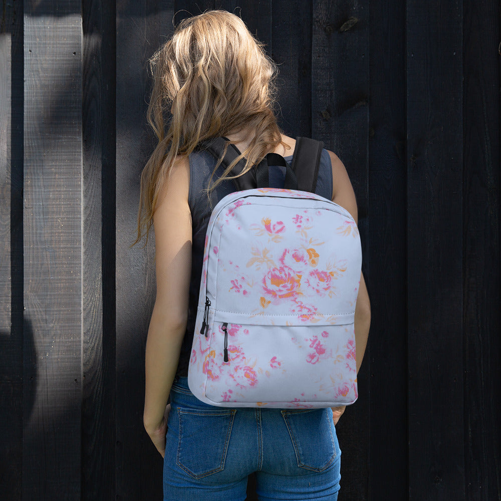 Pink roses on blue backpack