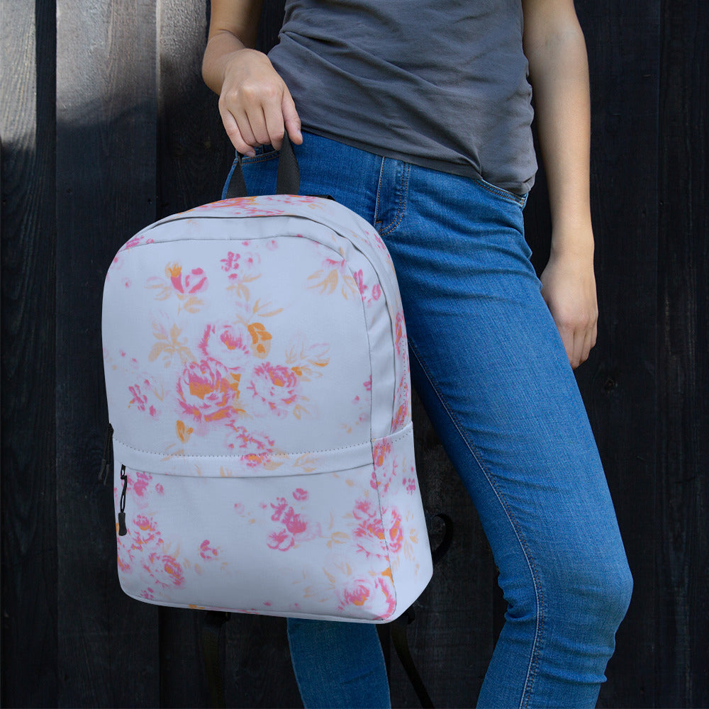 Pink roses on blue backpack